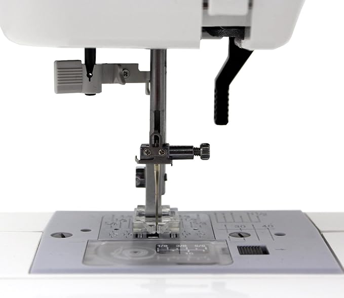 Janome MOD-19 Easy-to-Use Sewing Machine with 19 Stitches, Automatic Needle Threader and 5-Piece Feed Dogs,white