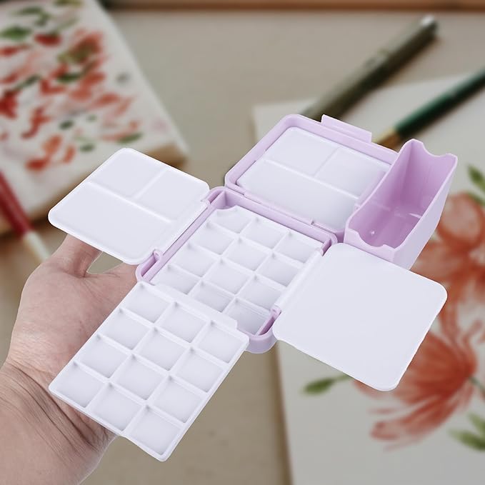 WTYONZEL Travel Pocket Watercolor Set, Artist Outdoor Sketch Kits with 24 Well Palette,3 Foldable Palettes,Clip-on Washing Bucket,Silicone Bag,Ideal for Outdoor Sketch Artists(Purple)