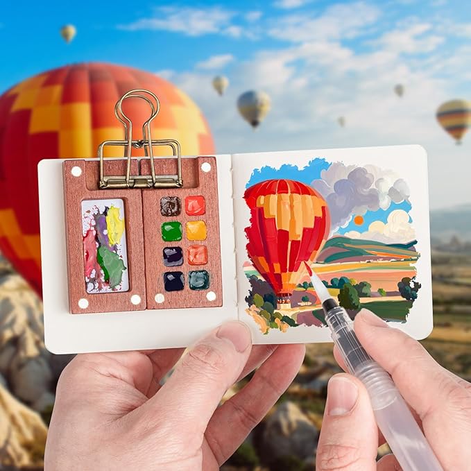 Mini Watercolor Travel Set, Mini Watercolor Paint Set with 2 Wooden 8-Grid Palette, 12 Colors Paint, 2 Sketch Books and 4 Brushes, Copper Clip and Sketchbook for Travel Painting