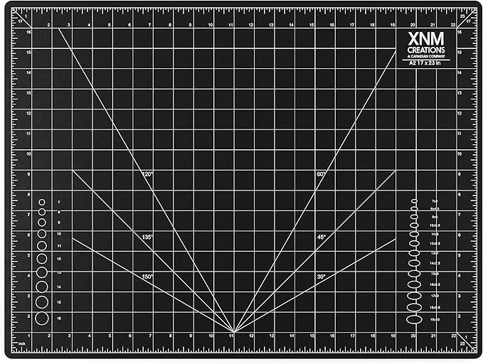 XNM Premium Self Healing Cutting Mat - 18 Inches by 24 inches - A2, 3 Layer Quality PVC Construction - Dual Sided, Imperial and Metric Grid Lines - Perfect for Cutting, Sewing, and Crafts