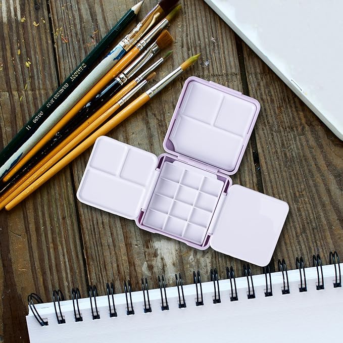 WTYONZEL Travel Pocket Watercolor Set, Artist Outdoor Sketch Kits with 24 Well Palette,3 Foldable Palettes,Clip-on Washing Bucket,Silicone Bag,Ideal for Outdoor Sketch Artists(Purple)