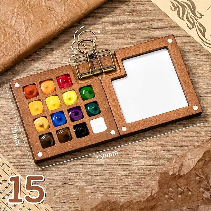 Mini Watercolor Paint Set, Mini Watercolor Travel Set with 1 Wooden 15-Grid Palette, 24 Colors Paint, 1 Sketch Books and 1 Brushes, Copper Clip and Sketchbook for Travel Painting