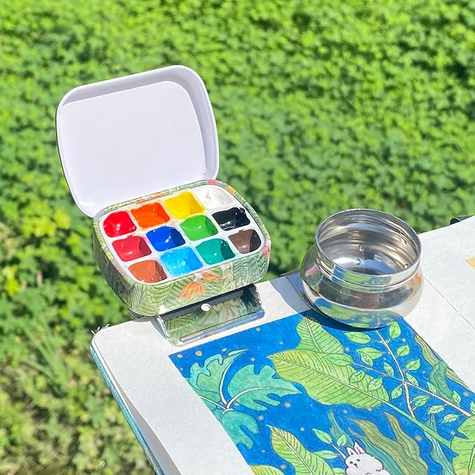 Portable Mini Tin Box,12-Well Empty Watercolor Palette,Small Paint Storage Travel Artist Outdoor Sketch Watercolor Kits with Magnetic Clip and Oil Pot .Selva