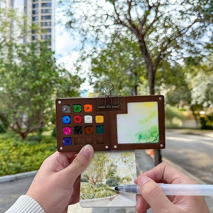 Zoorka Mini Watercolor Paint Set, Pocket Watercolor Set with 15-Well Walnut Wood Palette, Paints, Crossbody Bag, 100% Cotton Sketchbook, Paint Water Cup, Water Brush Ideal for Artists & Beginners