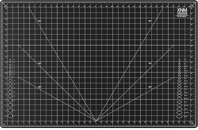 XNM Premium Self Healing Cutting Mat - 24 Inches by 36 inches - A1, 3 Layer Quality PVC Construction - Dual Sided, Imperial and Metric Grid Lines - Perfect for Cutting, Sewing, and Crafts